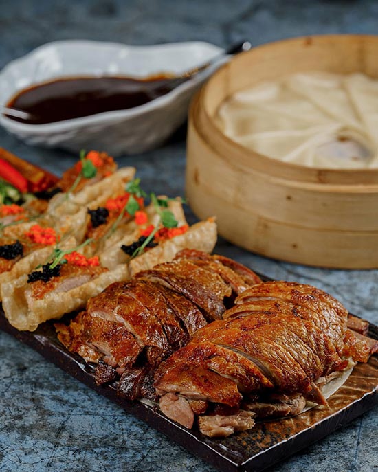 Качка по-пекінськи у ресторані BAO Качка по-пекінськи у ресторані BAO